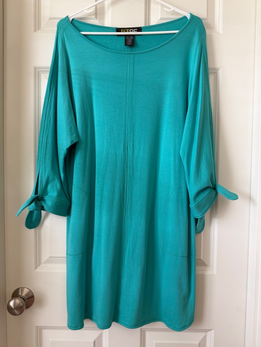 Pure Essence teal shift dress with relaxed fit and soft, breathable fabric.